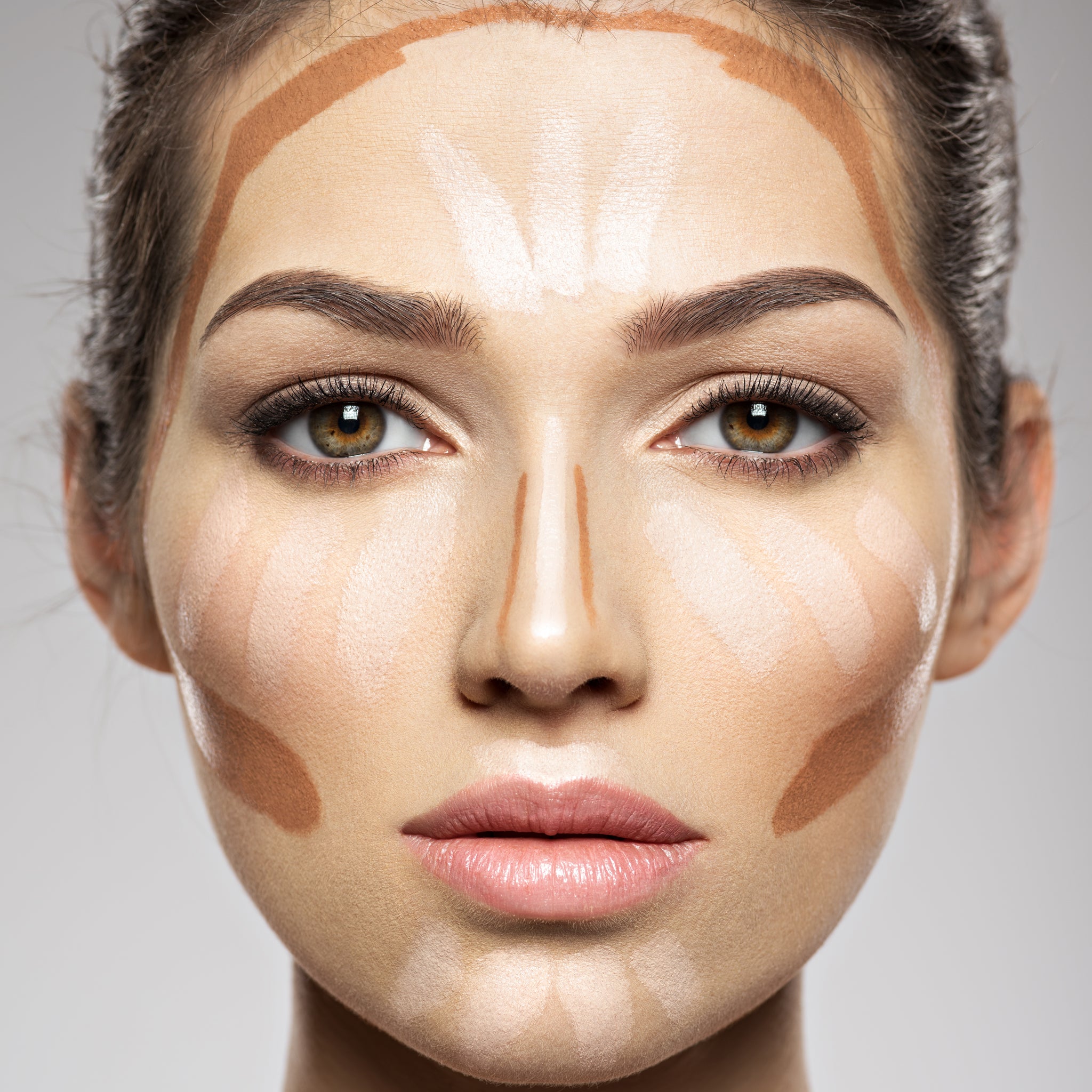 cosmetic-makeup-tonal-foundation-is-woman-s-face-beauty-treatment-concept-girl-makes-makeup-_1.jpg